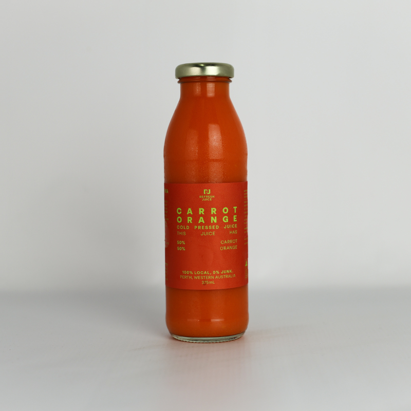 Half Carrot Half Orange Juice a delicious and healthy juice in a glass bottle