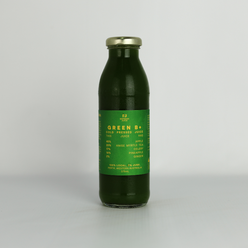Green B+ cold-pressed greens juice in a glass bottle with Anise Myrtle and Pineapple