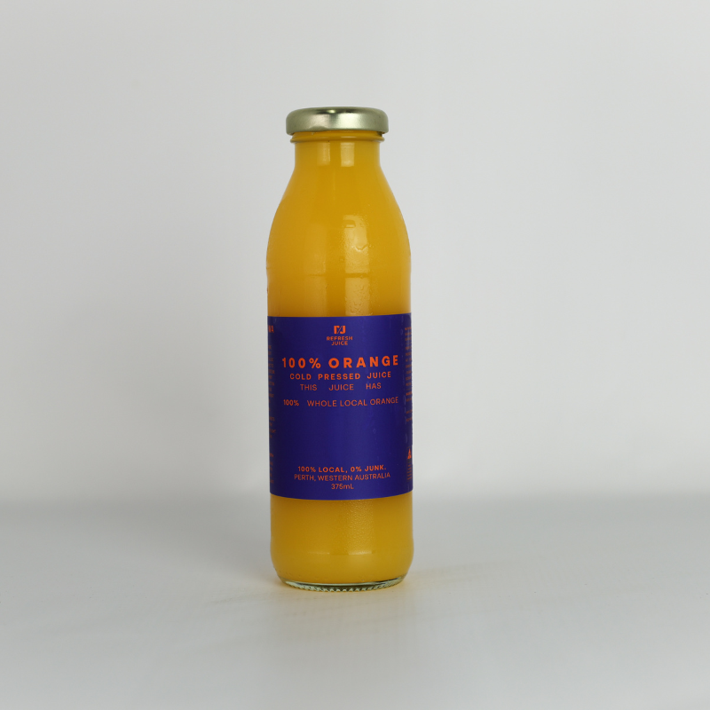 Cold-pressed 100% Orange Juice in a glass bottle