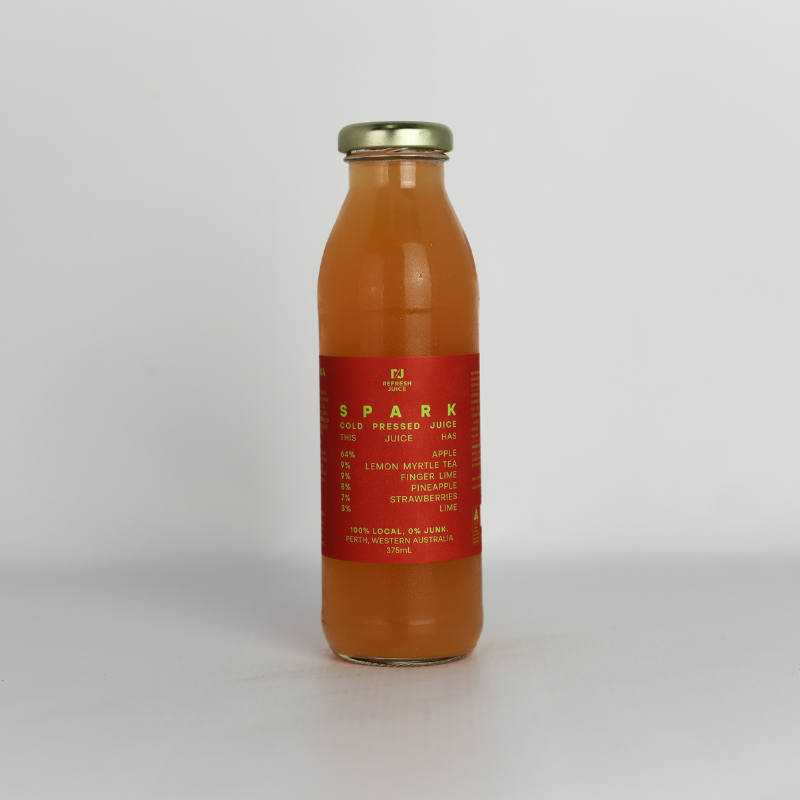 Our most ICONIC Juice with Strawberry, Pineapple, Strawberry, Lemon Myrtle and Finger LIme in a glass bottle 